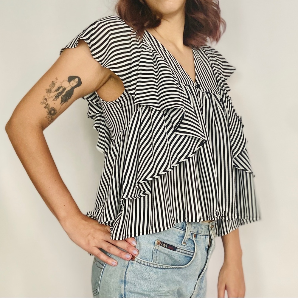 Flirty and fun ruffle sleeveless summer top